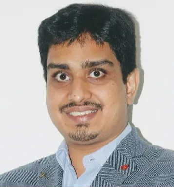Dr Kaumil Kothari